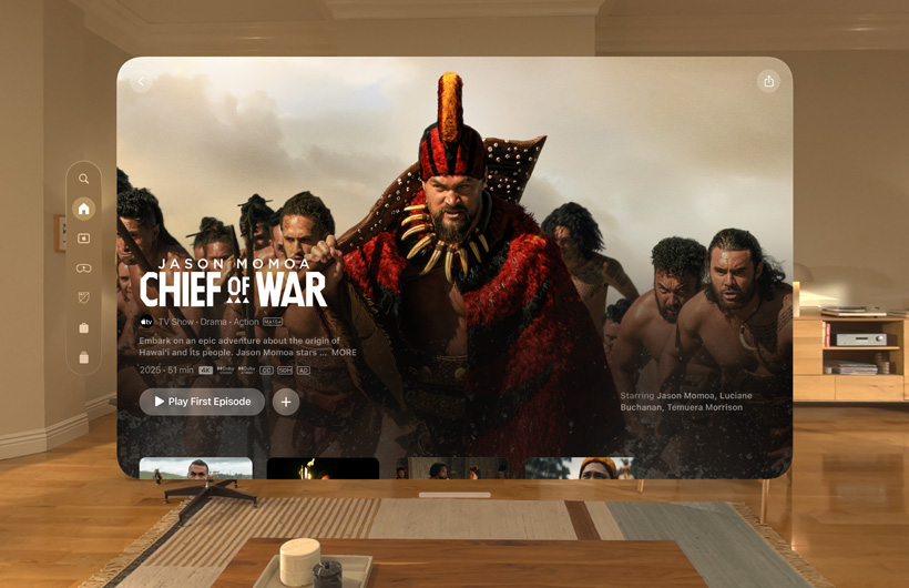 The Apple TV+ experience of Apple Vision Pro is displayed in a lounge room, with a still image from the Apple TV+ series Chief of War