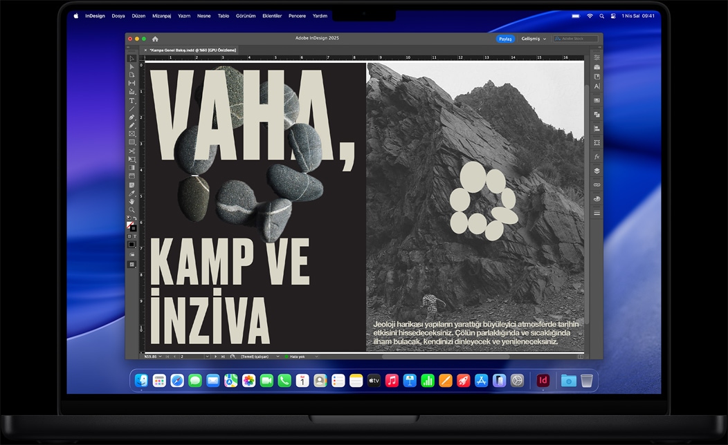 MacBook Pro ekranında bir inziva deneyiminin posterini hazırlamak için kullanılan Adobe InDesign gösteriliyor