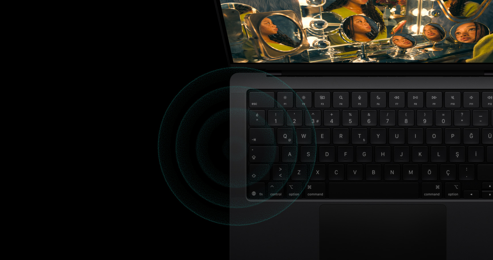 MacBook Pro’nun üstten görünümünde hoparlörler gösteriliyor