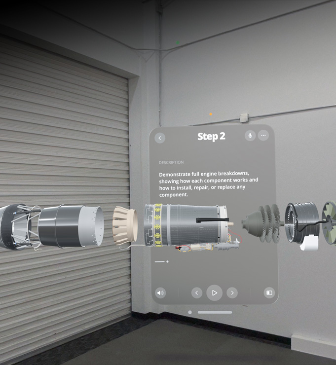 A digital display of engine assembly instructions says Step Two, with a description and image of the engine parts