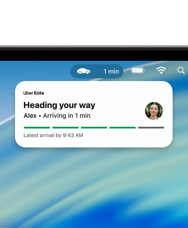 Extremo superior de la pantalla de un dispositivo Mac que muestra la barra de menús con una Actividad en Vivo ampliada de Uber Eats